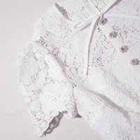 White lace top with short sleeves and peter pan collar