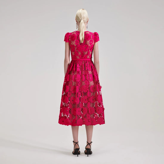 Raspberry pink lace midi dress with fitted bodice capped sleeves and tulip shaped skirt with detachable slip and fabric belt