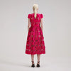 Raspberry pink lace midi dress with fitted bodice capped sleeves and tulip shaped skirt with detachable slip and fabric belt