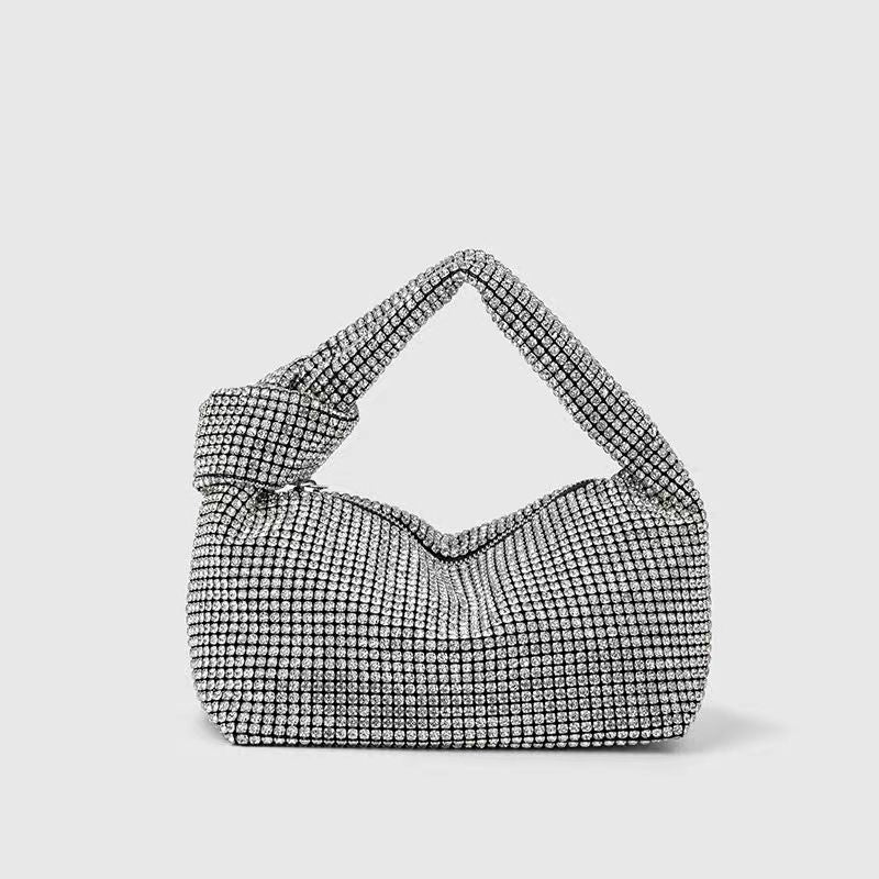 Silver studded Diamonte evening bag with a knot detail in the strap