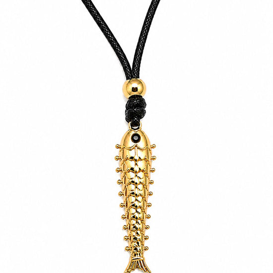Gold fish-shaped pendant on a black cord against a white background