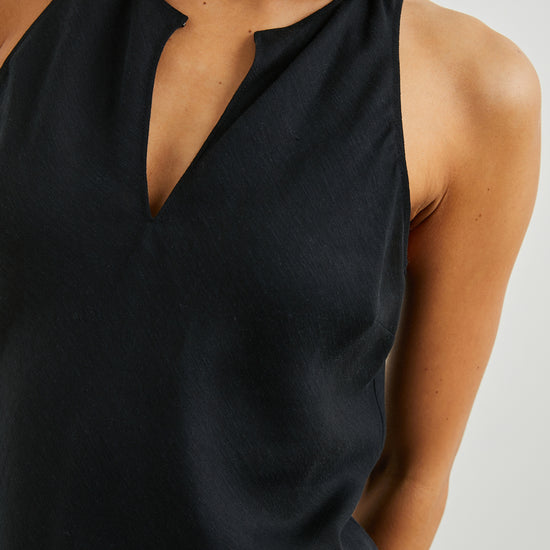 Sleeveless black top with racer back