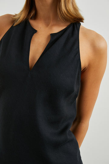 Sleeveless black top with racer back