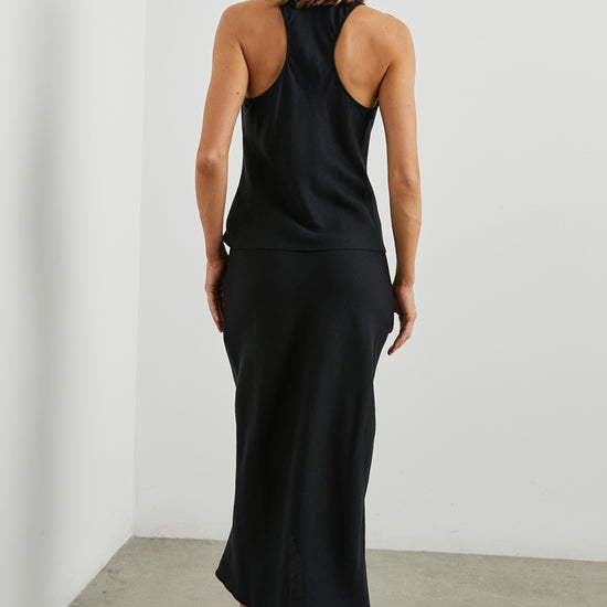 Sleeveless black top with racer back rear view