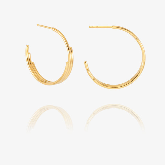 gold hoop earrings with varying sized pieces from rachel jackson