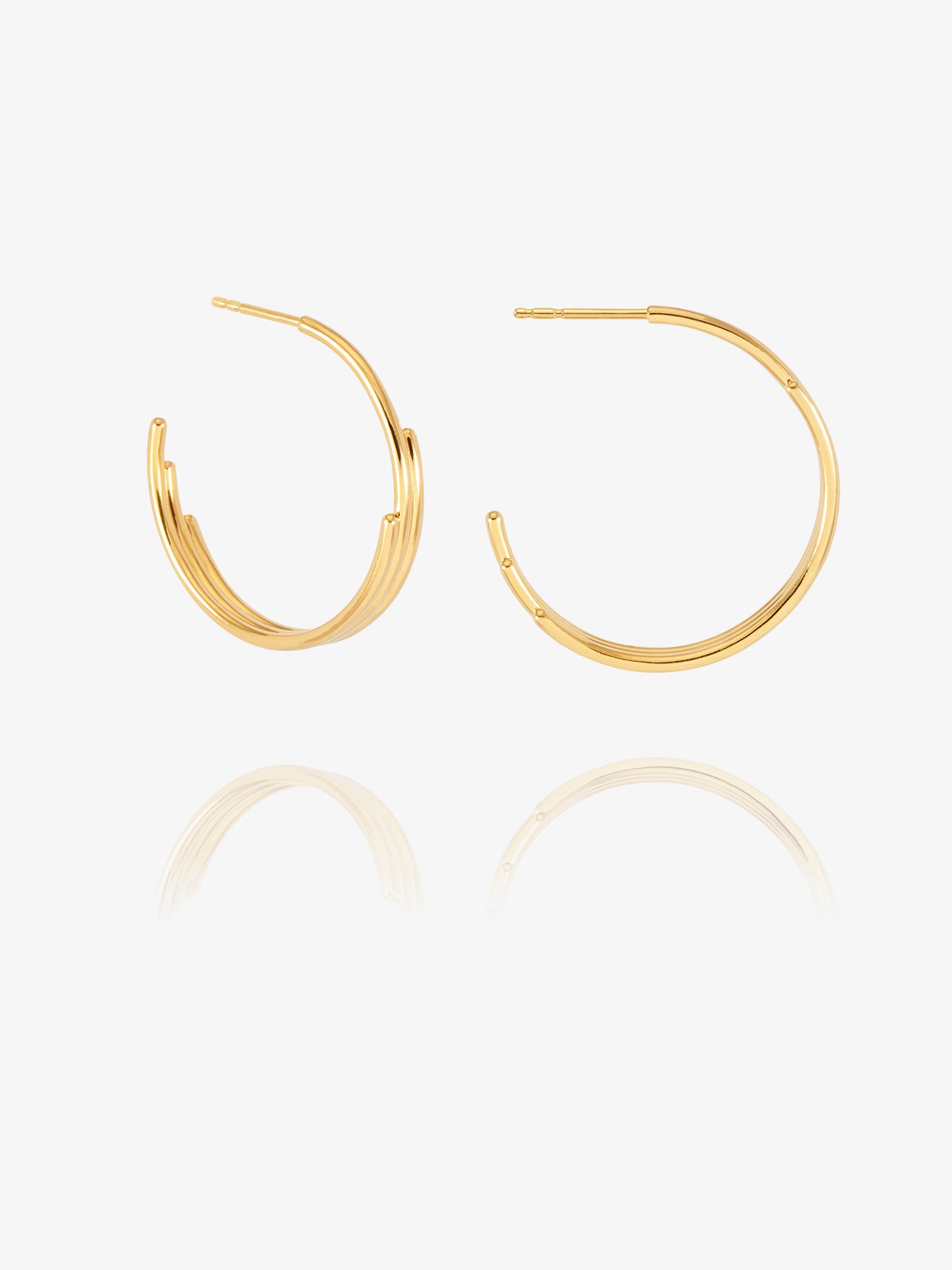 gold hoop earrings with varying sized pieces from rachel jackson