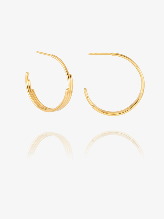 gold hoop earrings with varying sized pieces from rachel jackson