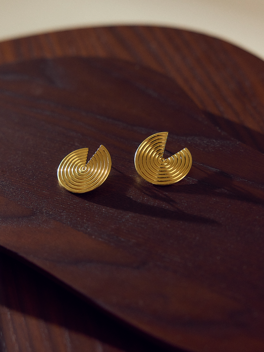 circular statement gold earring with triangle cut out from rachel jackson