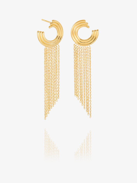 gold swirly circular hoops with chandelier style chains falling from the hoops from rachel jackson