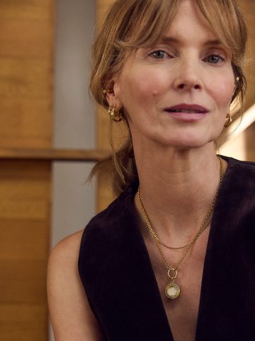 gold statement necklace with circle model shot