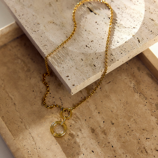 gold statement necklace with circle model shot 