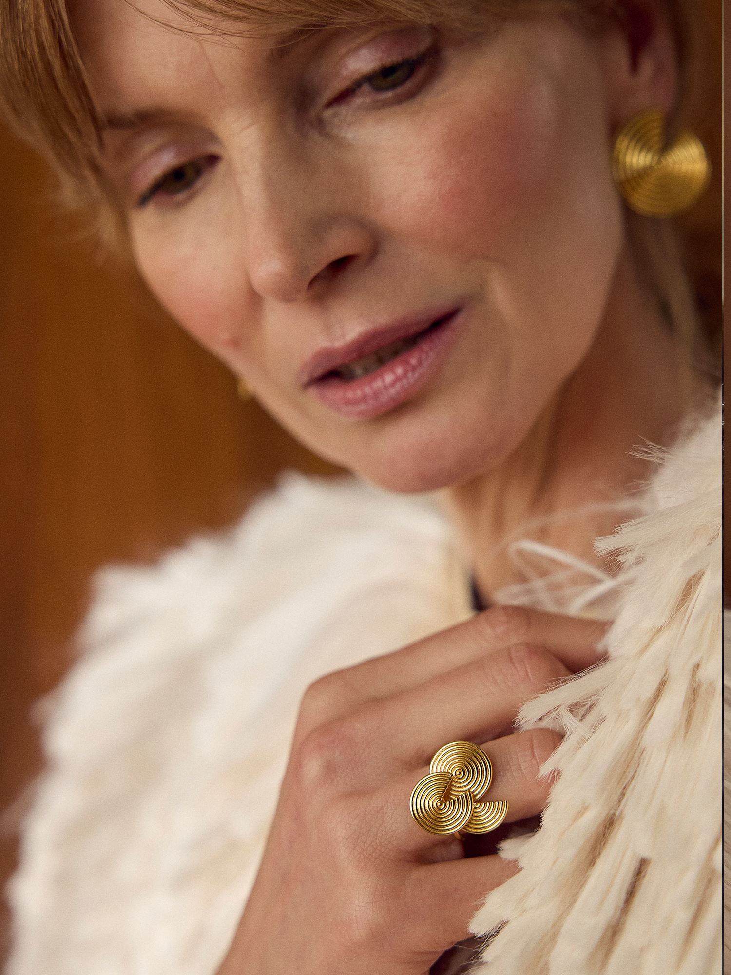 circular swirly ring with 3 circles with cut outs from rachel jackson model shot