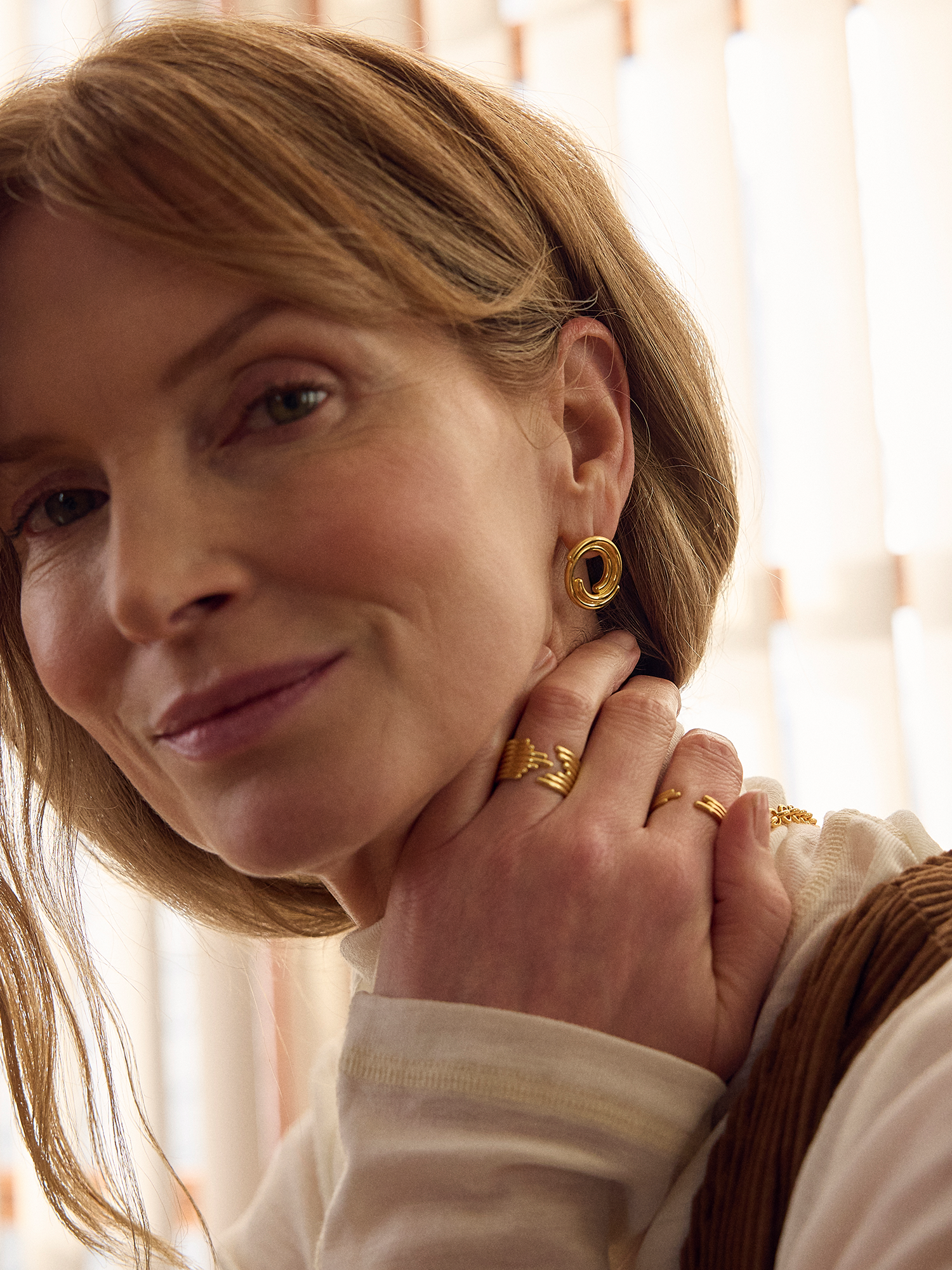 statement gold band ring with open section from rachel jackson model shot