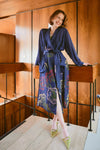 navy dressing gown with vibrant parsley seed flowers all over from one hundred stars model shot