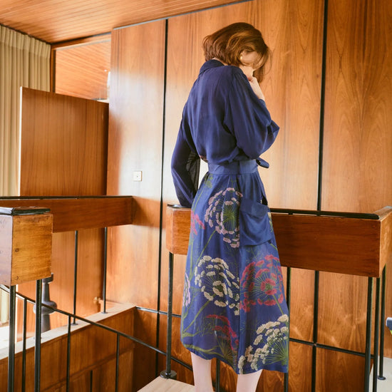 navy dressing gown with vibrant parsley seed flowers all over from one hundred stars rear view