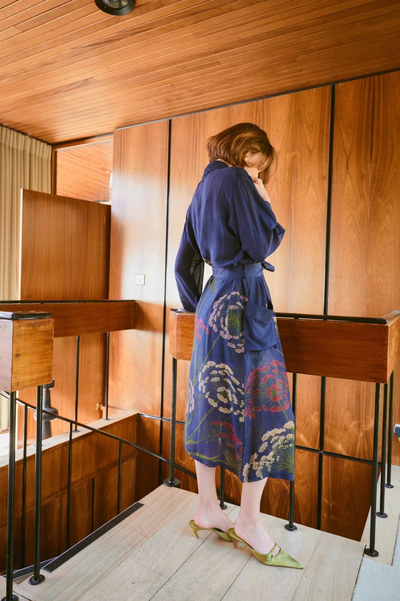 navy dressing gown with vibrant parsley seed flowers all over from one hundred stars rear view