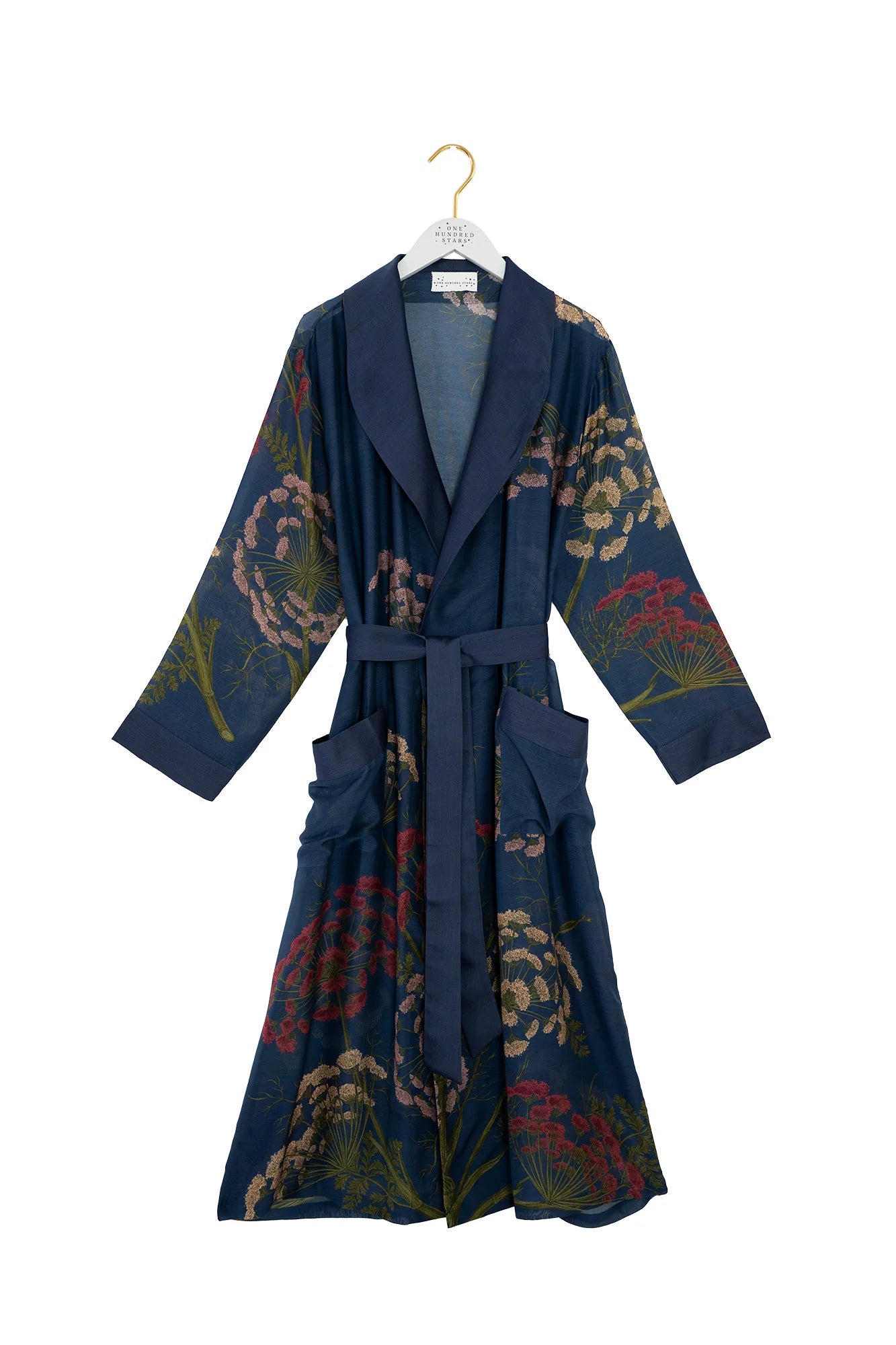navy dressing gown with vibrant parsley seed flowers all over from one hundred stars
