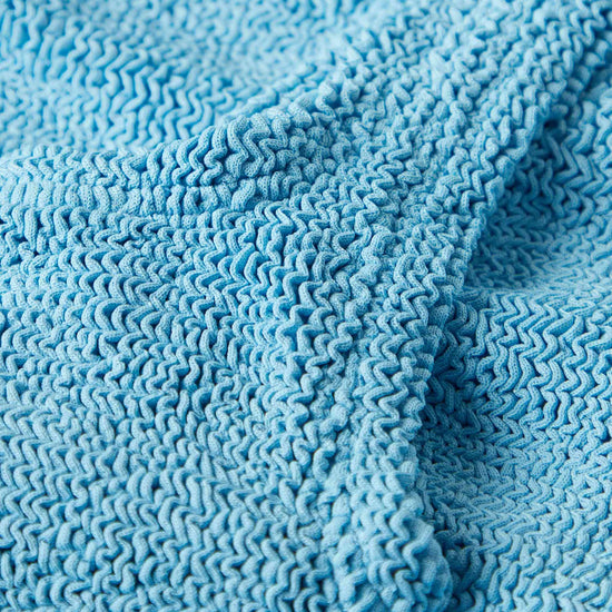 sqaure neck crinkle sky blue swimsuit from hunza g close up of fabric