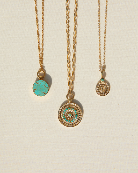 Three necklaces with turquoise stone details
