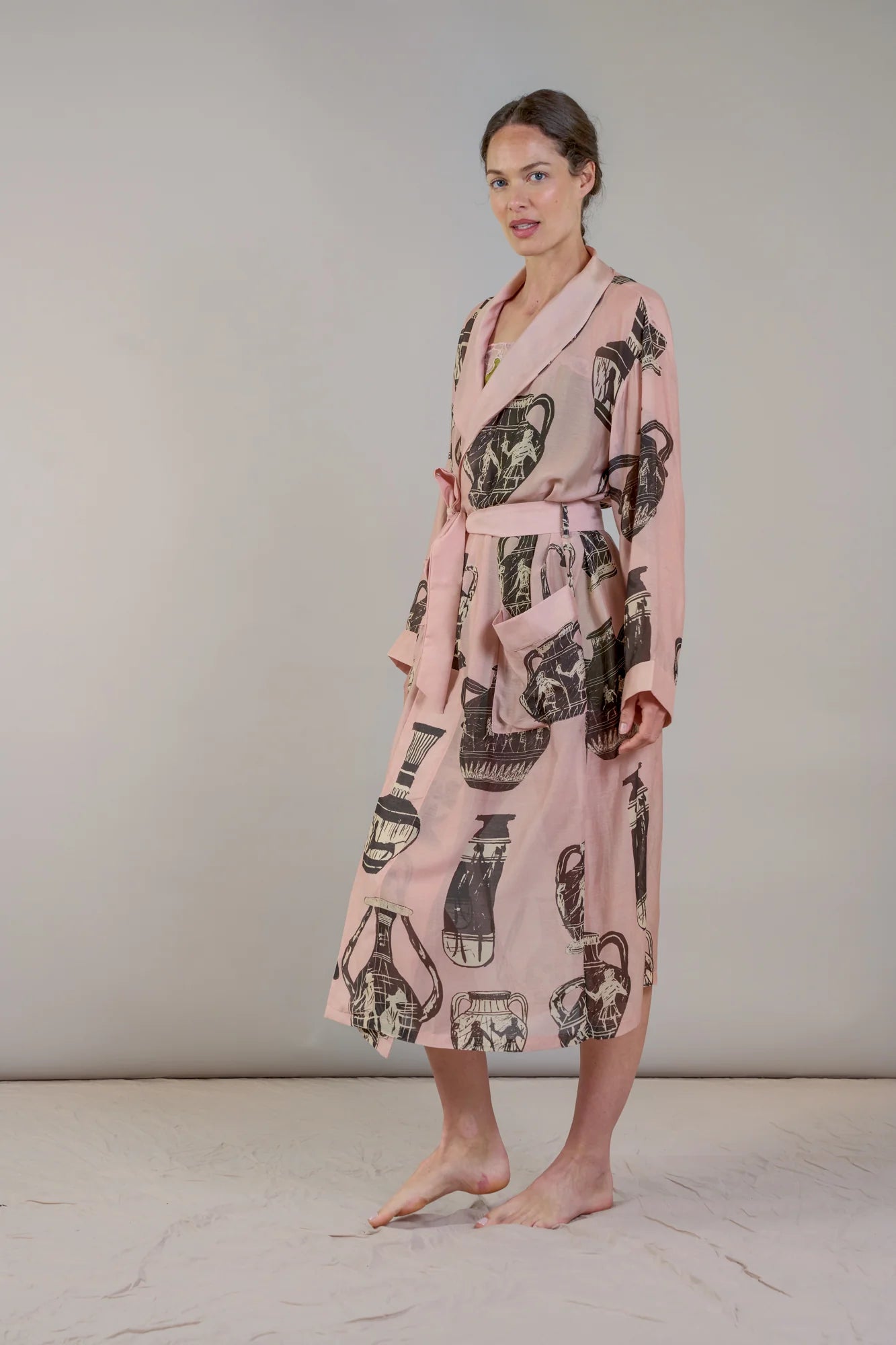 pink and dark grey robe with pots print  side view 