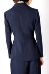navy structured blazer with 2 gold hammered buttons rear view