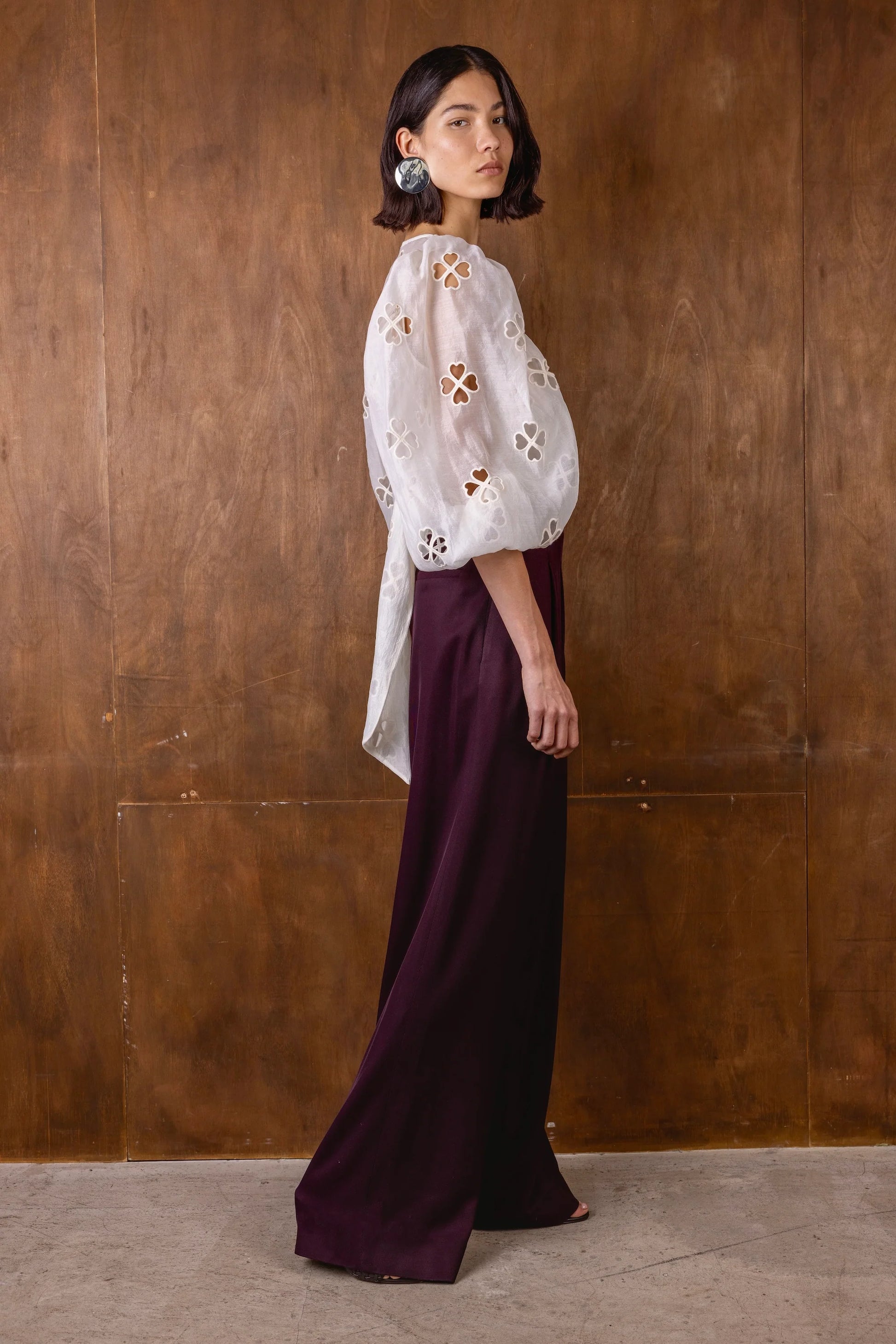 v neck sheer white blouse with tie at the front and blouson sleeves side view