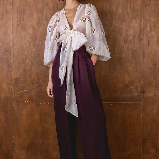 v neck sheer white blouse with tie at the front and blouson sleeves