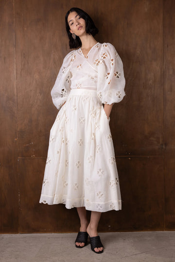 v neck sheer white blouse with tie at the front and blouson sleeves model shot