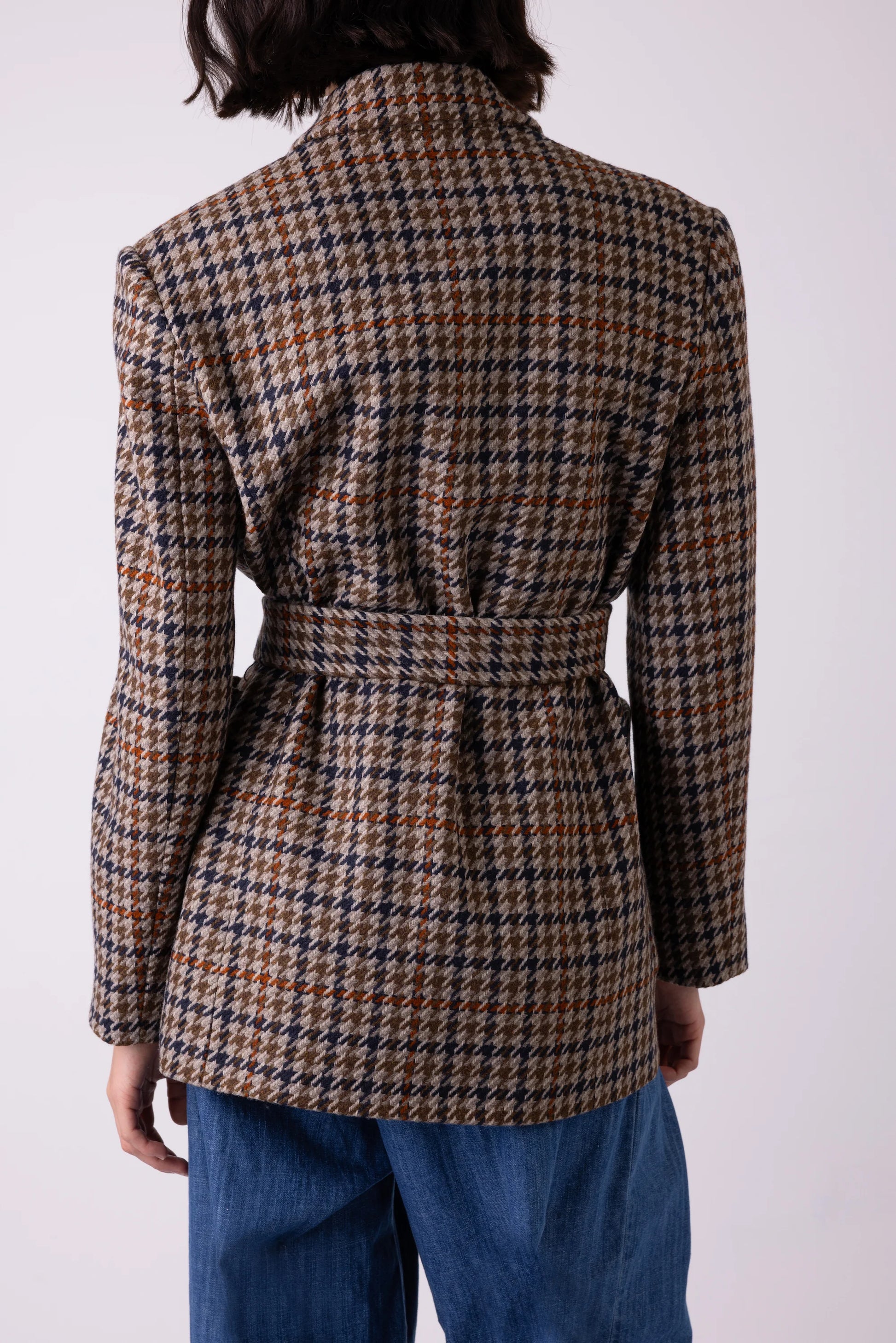 Rear view of brown check blazer with removable tie belt detail