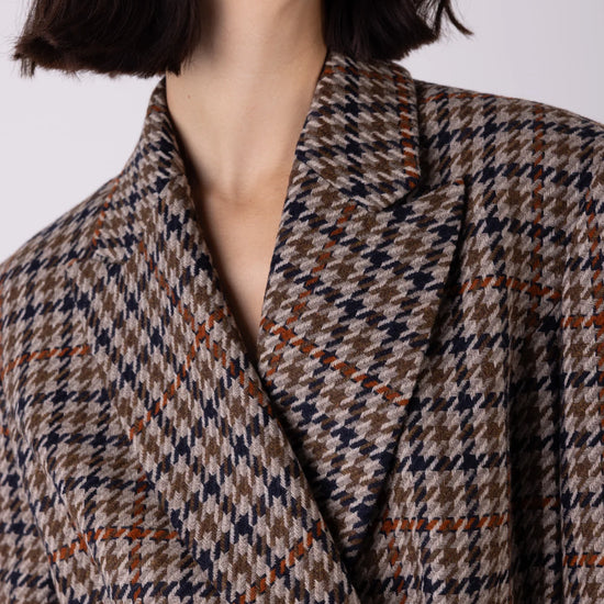 Close up of brown check blazer