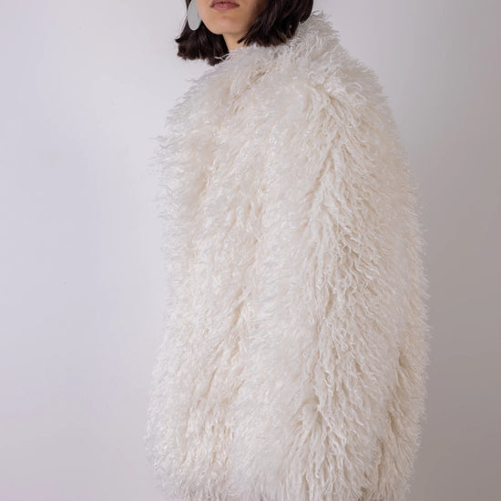 Cream shaggy faux fur jacket side view