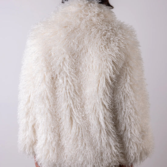 Cream shaggy faux fur jacket ear view