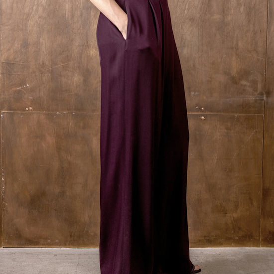 Side view of burgundy wide leg trousers