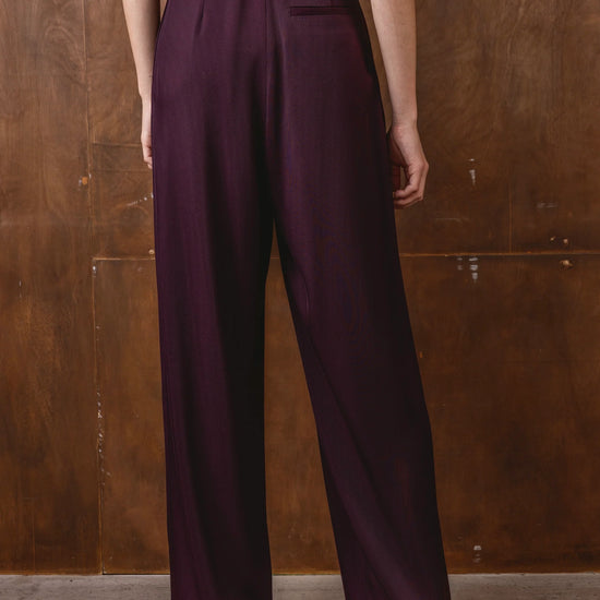 Rear view of burgundy wide leg trousers