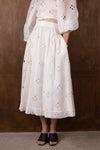 white semi sheer skirt with cut out details