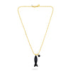 Gold necklace with a black fish pendant on a white background from talis chains