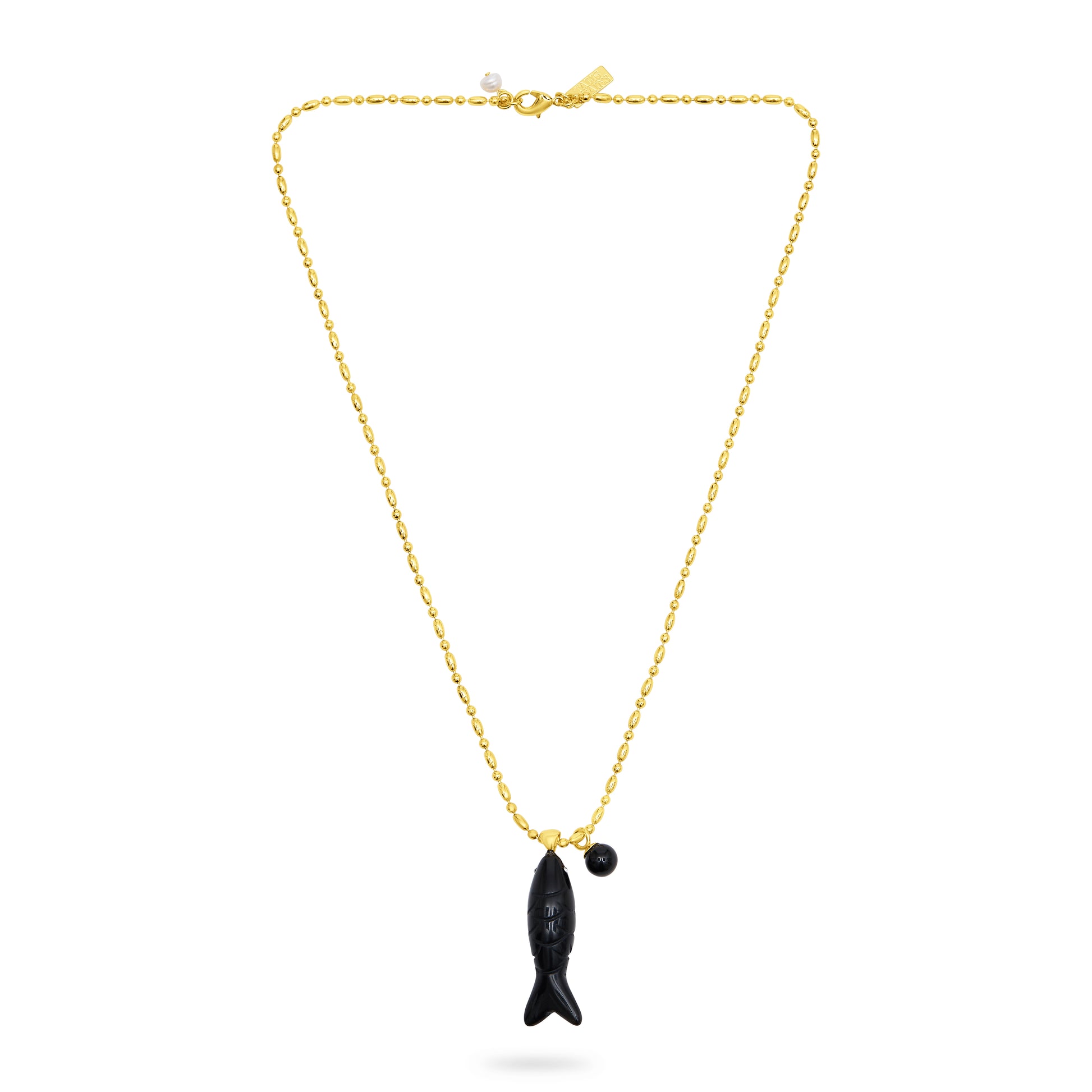 Gold necklace with a black fish pendant on a white background from talis chains