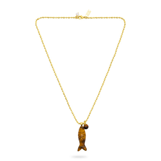 Gold necklace with a tiger's eye fish pendant on a white background from talis chains