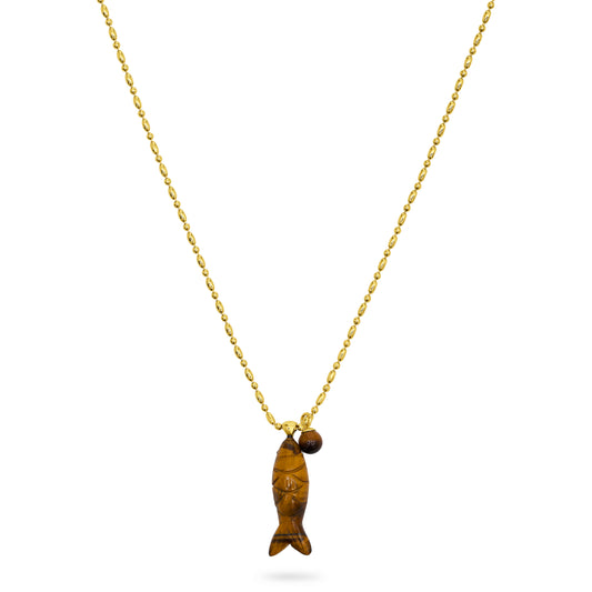 Gold necklace with a tigerseye stone fish-shaped pendant on a white background from talis chains