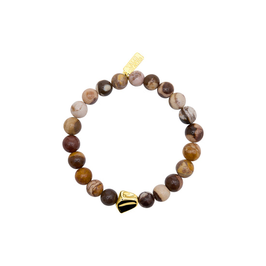 Beaded bracelet with a gold nugget charm on a white background from talis chains