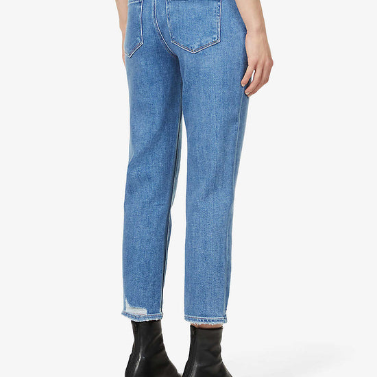 Boyfriend skinny jeans in a mid wash and distressing classic five pocket design