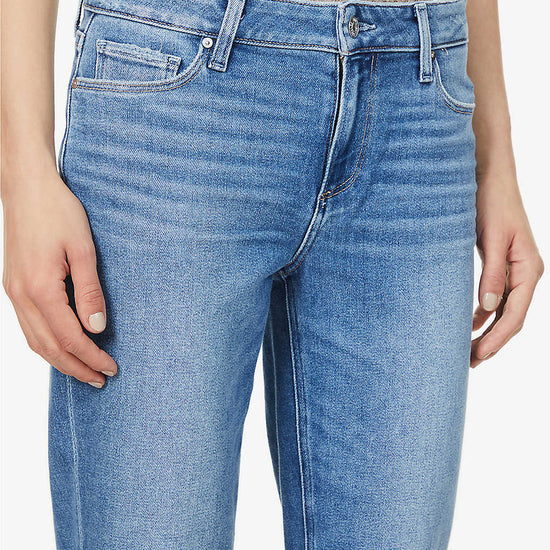 Boyfriend skinny jeans in a mid wash and distressing classic five pocket design