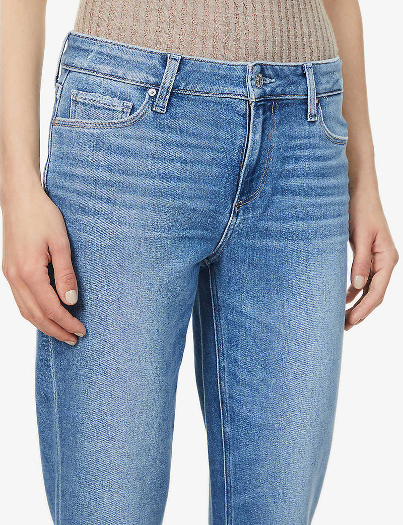 Boyfriend skinny jeans in a mid wash and distressing classic five pocket design