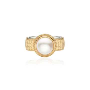 gold dotted ring with pearl in the centre