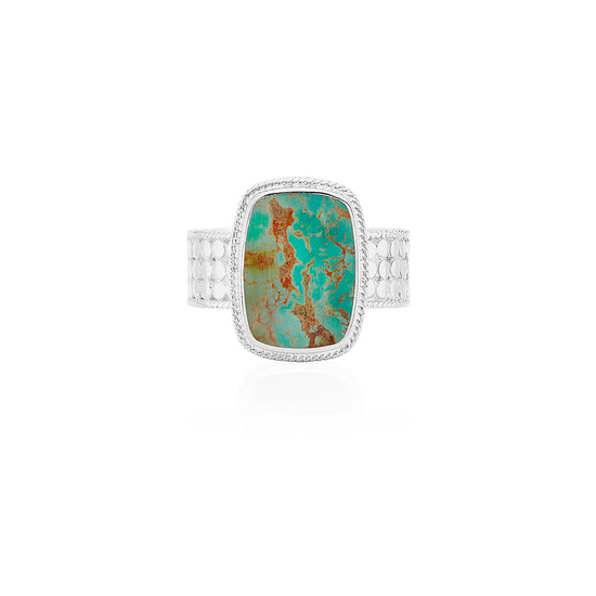 Cocktail ring with silver frame and turquoise inset stone