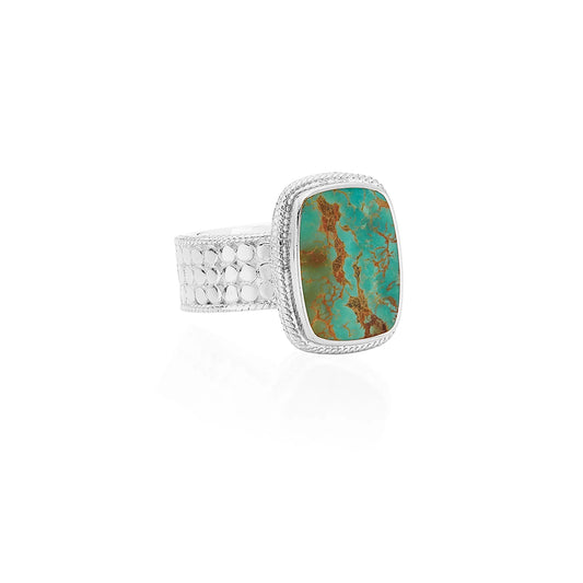 Cocktail ring with silver frame and turquoise inset stone