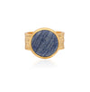 Cocktail ring with a blue stone on a gold band