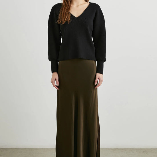 dark green brown long skirt with elasticated waist and a line shape