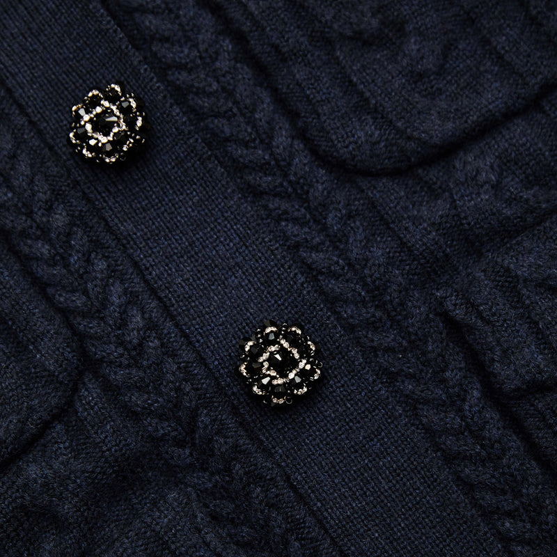 Navy collared cable knit cardigane with collar four patch pockets and decorative diamante and beaded buttons
