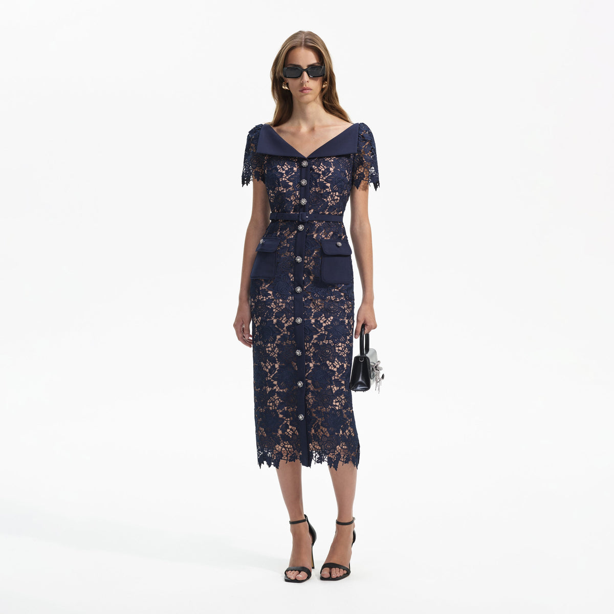 Navy open V neck  fitted lace midi dress with short sleeves two front patch pockets and diamante and beaded buttons running the full length with full beige lining
